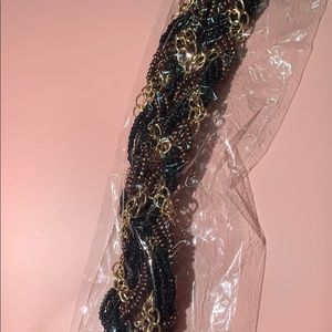 black and gold necklace and earrings